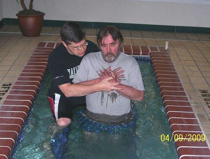Robert Fernald beign Baptised