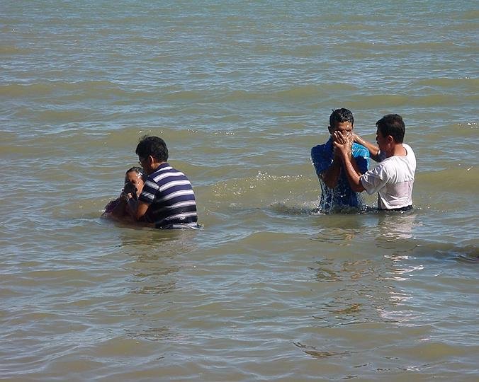 Elders Tadea & Vidal baptizing Diana Jane Suarez & Rodel Duller
