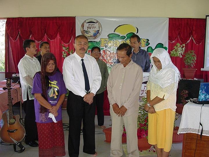 Newly appointed deacons with their wives-Deacons Nolito Agudo (L), Aaron Zabate (R)