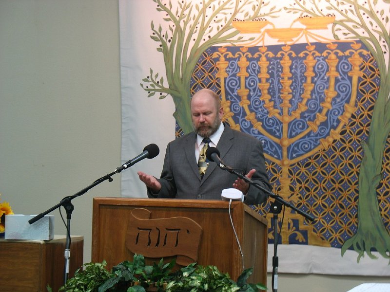 Brother John offering prayer